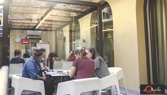 students at a table FUA