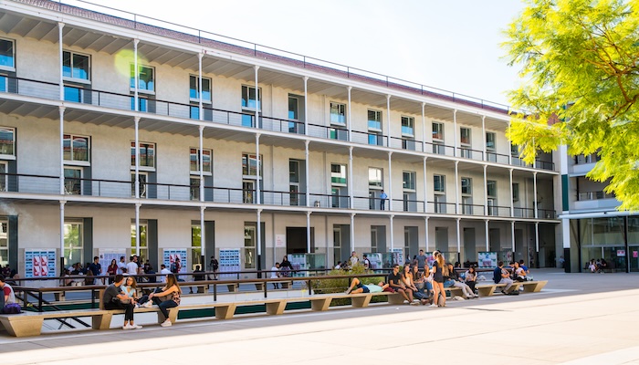 UPF school building with students out front